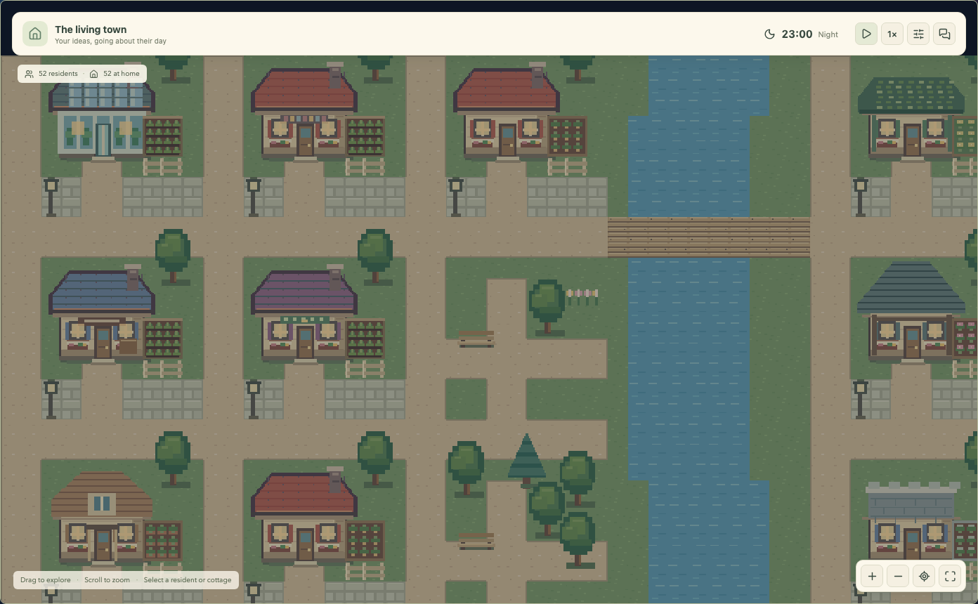 The demonstration town at night with illuminated cottage windows and quiet paths